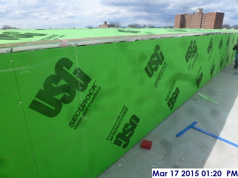 Started closing up the walls at the lower roof Facing West